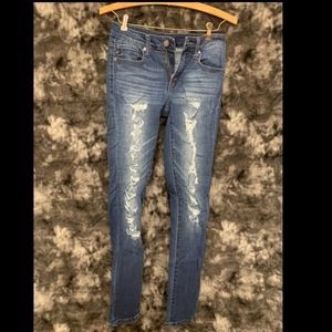 Kan Can Ripped Jeans with Black Fabric Under Rips